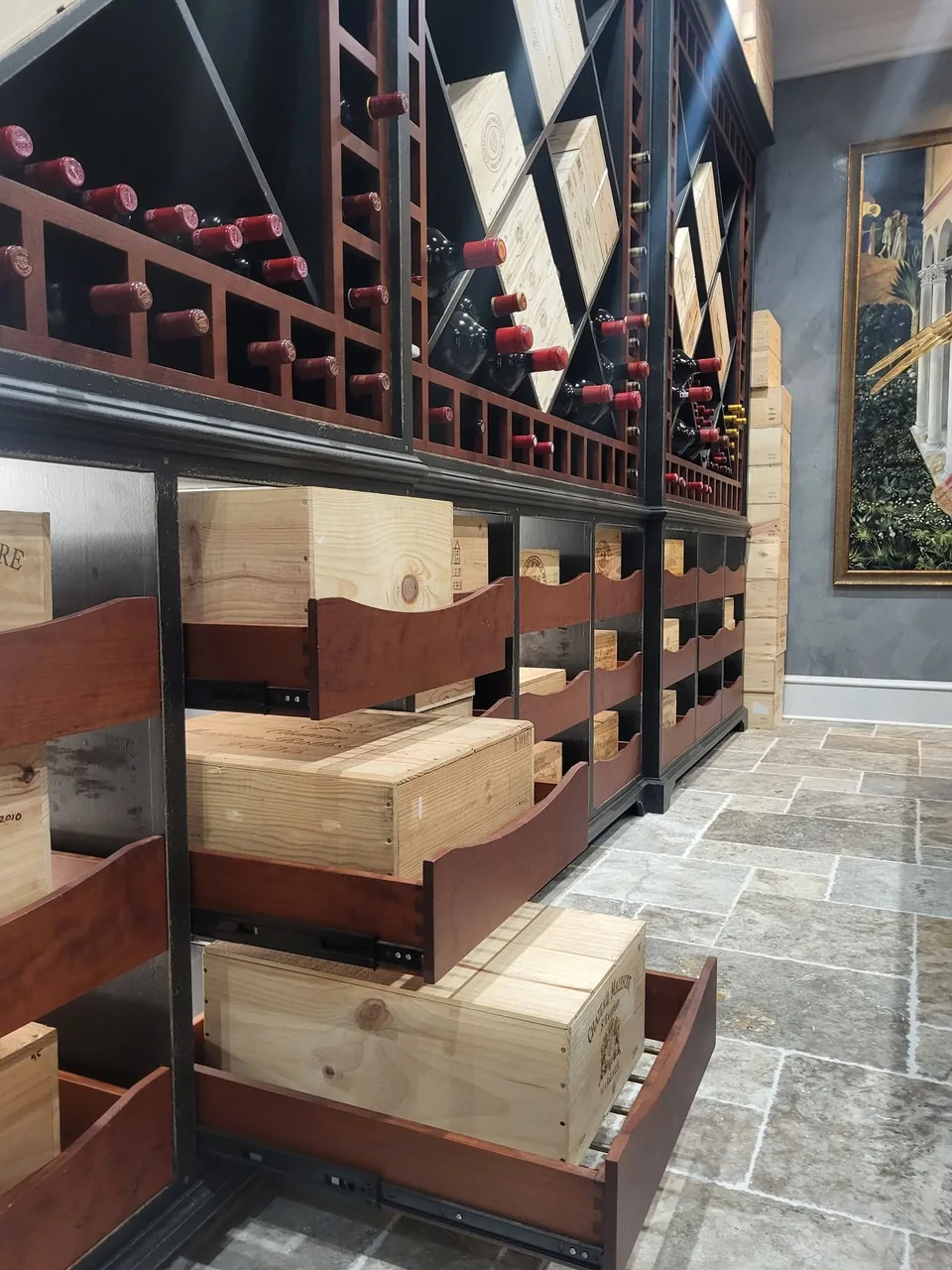 Wine cellar crate drawers extended on full-extension slides.